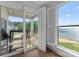 Balcony with beach view, including outdoor seating and white shutters at 17811 Half Moon Ln # E, Cornelius, NC 28031