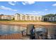 Dock chairs provide a relaxing spot with panoramic views of the lake and surrounding upscale residences at 17811 Half Moon Ln # E, Cornelius, NC 28031