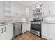 Modern kitchen featuring stainless steel appliances and granite countertops at 17811 Half Moon Ln # E, Cornelius, NC 28031