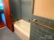 Bathroom featuring blue tile and a tub at 1834 Sharonwood Ln, Rock Hill, SC 29732