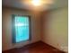 Bedroom with wood floors and a window at 1834 Sharonwood Ln, Rock Hill, SC 29732