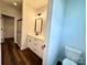 Bright bathroom featuring a dual-sink vanity, a walk-in shower, and a modern aesthetic at 211 Surrey Oak Ln, Charlotte, NC 28216