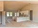 Unfinished, spacious kitchen featuring modern white cabinets, an island, and ample natural light at 3500 14Th Sw Ave, Hickory, NC 28602