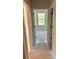 Bright bedroom featuring neutral walls, white trim, and a view of a tree-lined backyard at 3506 14Th Sw Ave, Hickory, NC 28602