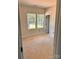 Bright bedroom showcasing two windows that overlook the yard, neutral walls, and white trim at 3506 14Th Sw Ave, Hickory, NC 28602