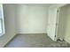 A bright bedroom with carpet, closet and windows offering a pleasant view at 405 S South St, Gastonia, NC 28052