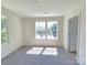 A bedroom with a window offering plenty of natural light at 405 S South St, Gastonia, NC 28052