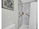 Sleek walk-in shower features elegant marble-look tile and modern fixtures at 4121 Dover St, Claremont, NC 28610