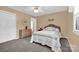 Beige bedroom with neutral finishes, lots of light, and neutral-toned accents at 4121 Dover St, Claremont, NC 28610