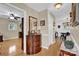 Well-lit foyer with hardwood floors and decorative furniture at 4121 Dover St, Claremont, NC 28610