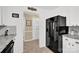 Efficient kitchen with stainless steel appliances, granite countertops, and access to the front door at 4121 Dover St, Claremont, NC 28610