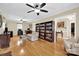 Inviting living room with hardwood floors, built-in bookshelves, and neutral wall colors at 4121 Dover St, Claremont, NC 28610