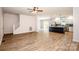 Spacious living room featuring hardwood floors and an open floor plan at 7039 Executive Cir, Denver, NC 28037