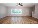 Bright living room with natural light, hardwood floors, and a welcoming atmosphere at 7039 Executive Cir, Denver, NC 28037