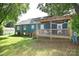 Backyard with covered deck and ample lawn space at 792 W Nc Hwy 150 St, Lincolnton, NC 28092