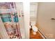 Bathroom featuring a shower and commode at 792 W Nc Hwy 150 St, Lincolnton, NC 28092