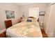 Bedroom featuring hardwood floors, a comfy bed, and natural light from the window, great for relaxing at 792 W Nc Hwy 150 St, Lincolnton, NC 28092