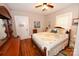 Bedroom featuring hardwood floors, a comfy bed, and natural light from the window, great for relaxing at 792 W Nc Hwy 150 St, Lincolnton, NC 28092