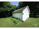 White garage surrounded by green lawn and trees at 792 W Nc Hwy 150 St, Lincolnton, NC 28092