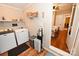 Convenient laundry room with washer, dryer, and shelving at 792 W Nc Hwy 150 St, Lincolnton, NC 28092