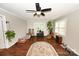 Bright living room featuring hardwood floors, neutral walls, ceiling fan and plentiful windows with natural light at 792 W Nc Hwy 150 St, Lincolnton, NC 28092