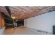 Unfinished basement with exposed insulation, pipes, and a concrete floor at 8510 Glade Ct, Huntersville, NC 28078