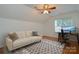 Cozy bedroom with light walls, ceiling fan, and a window that provides natural light at 8510 Glade Ct, Huntersville, NC 28078
