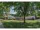 Community pool area with lush landscaping, pool, and community building at 8510 Glade Ct, Huntersville, NC 28078