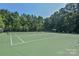 Exterior shot of a community tennis court, ready for a friendly match at 8510 Glade Ct, Huntersville, NC 28078
