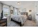 Comfortable bedroom with large windows, neutral decor, and a spacious layout for relaxation at 958 Skywater Dr, Fort Mill, SC 29715