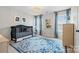 Charming Bedroom with a crib, soft blue accents, decorative rug, and ample natural light at 958 Skywater Dr, Fort Mill, SC 29715