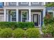 Close up of a front porch featuring flowers and well manicured bushes at 958 Skywater Dr, Fort Mill, SC 29715