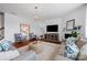 Comfortable living room with modern furniture, fireplace, and hardwood flooring at 958 Skywater Dr, Fort Mill, SC 29715