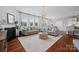 Spacious living room with hardwood floors, fireplace, and lots of natural light at 958 Skywater Dr, Fort Mill, SC 29715