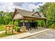 Community mail kiosk featuring a covered structure with stone columns and convenient access for residents at 958 Skywater Dr, Fort Mill, SC 29715