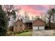 Charming brick home with two-car garage and well-maintained landscaping at 9600 Lockhorn Ct, Mint Hill, NC 28227