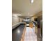Open kitchen with ample counter space, wood cabinetry, and seamless flow to the living space at 9730 Elizabeth Townes Ln, Charlotte, NC 28277