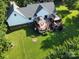 Expansive backyard featuring a two-tiered deck with gazebos, mature trees, and lush green lawn at 135 Primrose Dr, Salisbury, NC 28147