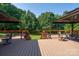 Backyard deck featuring dual gazebos, perfect for relaxation and entertainment at 135 Primrose Dr, Salisbury, NC 28147