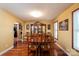 Elegant dining room with hardwood floors, wainscoting, and a large dining table at 135 Primrose Dr, Salisbury, NC 28147