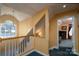Bright hallway featuring a staircase and large window, creating a welcoming and airy atmosphere at 135 Primrose Dr, Salisbury, NC 28147