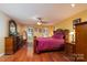 Comfortable bedroom featuring hardwood floors, natural lighting, and classic decor at 135 Primrose Dr, Salisbury, NC 28147
