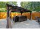 Backyard patio with hot tub, privacy fence and covered gazebo at 135 Primrose Dr, Salisbury, NC 28147