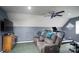 Finished recreation room with ceiling fan, TV and home gym, perfect for entertainment and fitness at 135 Primrose Dr, Salisbury, NC 28147