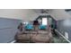 Finished recreation room with ceiling fan, comfortable seating and home gym, perfect for relaxation at 135 Primrose Dr, Salisbury, NC 28147
