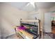 Bright room featuring a crafting machine, a large window, carpeted floors and neutral wall color at 140 Quiet Cove Rd, Mooresville, NC 28117