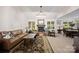 Spacious living room featuring a fireplace, comfortable seating, and natural light at 140 Quiet Cove Rd, Mooresville, NC 28117