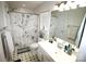 Bathroom with shower with leaf patterned shower curtain at 148 W Walnut Ave, Mount Holly, NC 28120