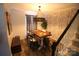Charming dining area with stylish decor and wood-look flooring at 148 W Walnut Ave, Mount Holly, NC 28120