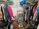 Walk-in closet with shelving, clothing, and storage at 148 W Walnut Ave, Mount Holly, NC 28120